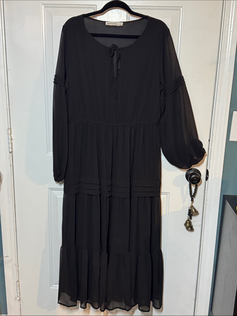 Flowing Black Tiered Maxi Dress with Tie Neck